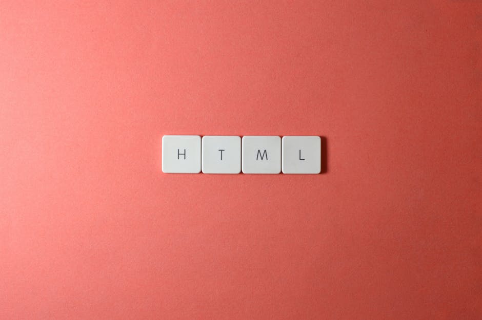 Four white square tiles with black letters spelling 'HTML' arranged in a row on a solid coral-pink background, with no visible cleaning tools or surfaces present, emphasizing a clean and minimalistic 